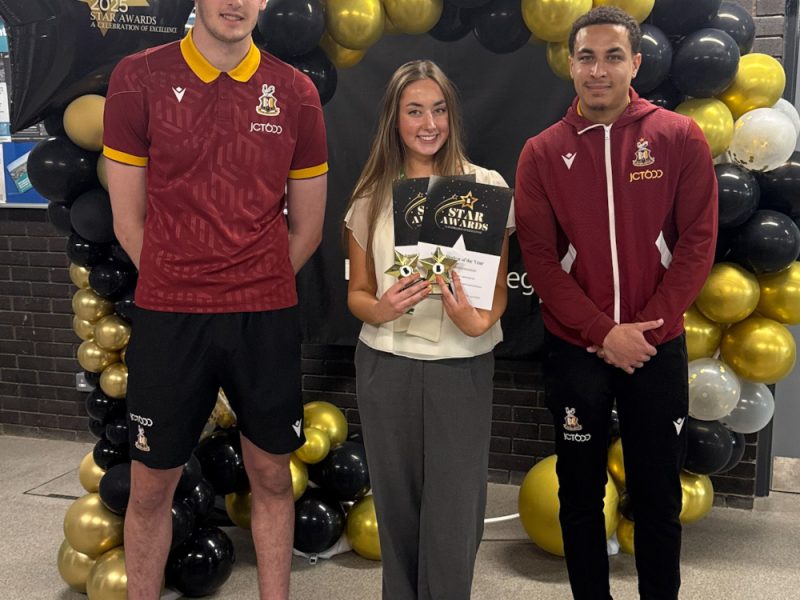2.-Faye-Oxley-receiving-her-awards-with-BCFC-players-Zac-Hadi-and-Lewis-Richards